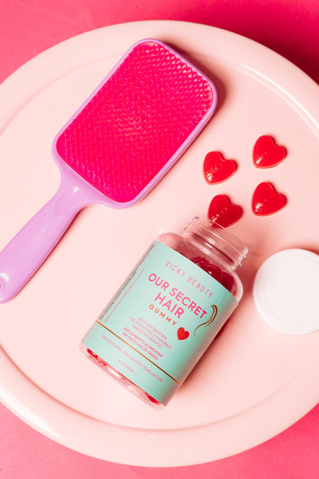 Queda de cabelo feminina: causas, prevenção e como os suplementos ajudam